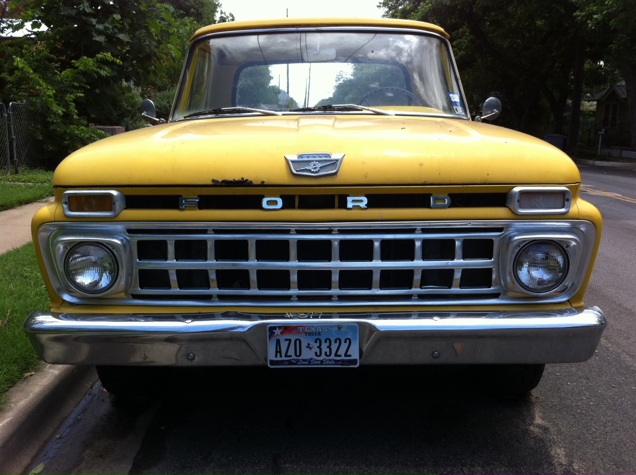 yellow Ford F100 front in Austin
