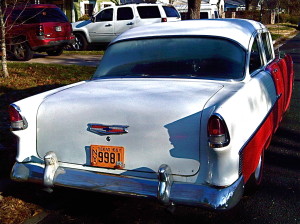 1955 Chevrolet Two Door Sedan red over white