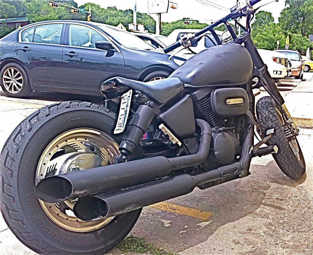 Sinister Black Motorcycle at Bakery on Hancock Dr.