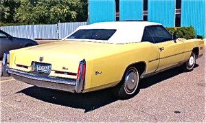 Yellow Eldorado Cadillac Converible rear quarter