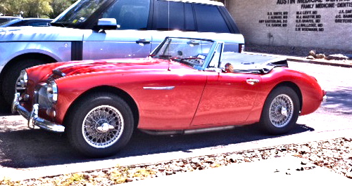 red Austin Healey side view