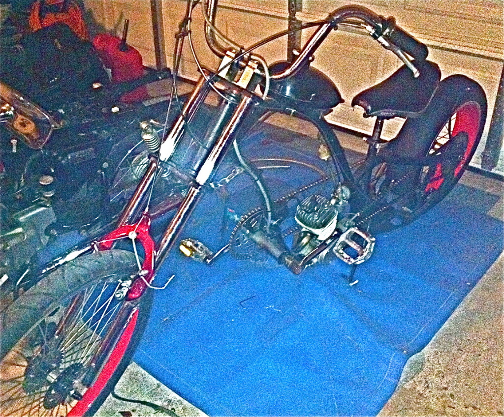 Lowrider moped in garage in austin