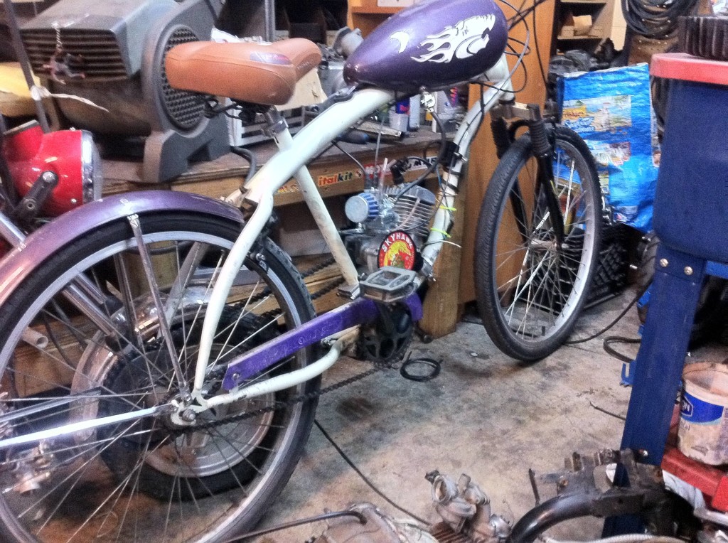 Motorized Purple bike at Austin Mopeds