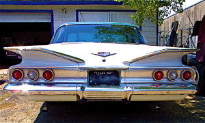 White 1960 Chevrolet Impala Sedan in Austin, rear view