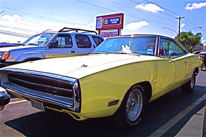 Yellow 1970 Dodge Charger on S Lamar front quarter