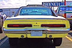 Yellow 1970 Dodge Charger on S Lamar rear_2