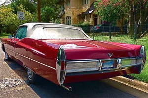 Red 1967 Cadillac Convertible in Zilker rear