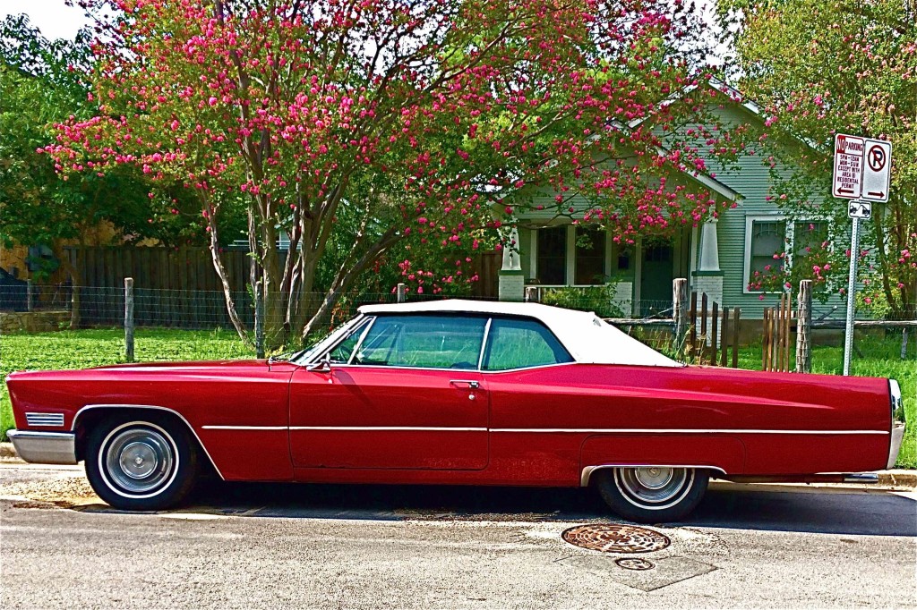 Red 1967 Cadillac Convertible in Zilker side