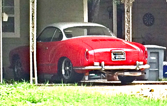 Red and white karmann Ghia in Austin