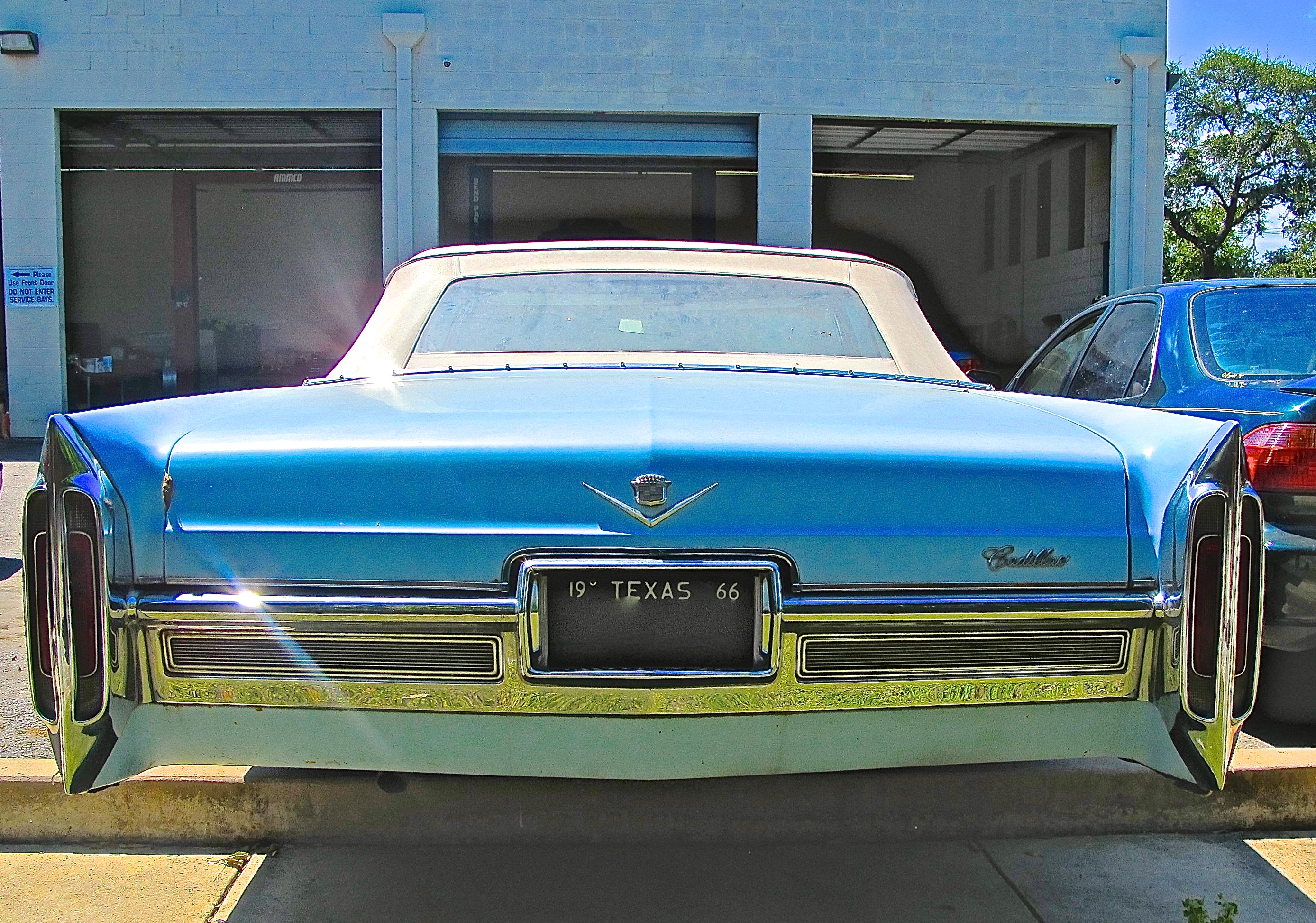 1966 Cadillac Convertible in S. Central Austin - rear