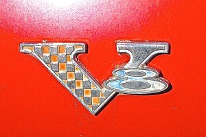 1965 Plymouth Valiant in Austin TX. V8 emblem
