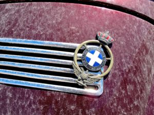 Classic VW convertible in Santorini, Greece, detail emblem