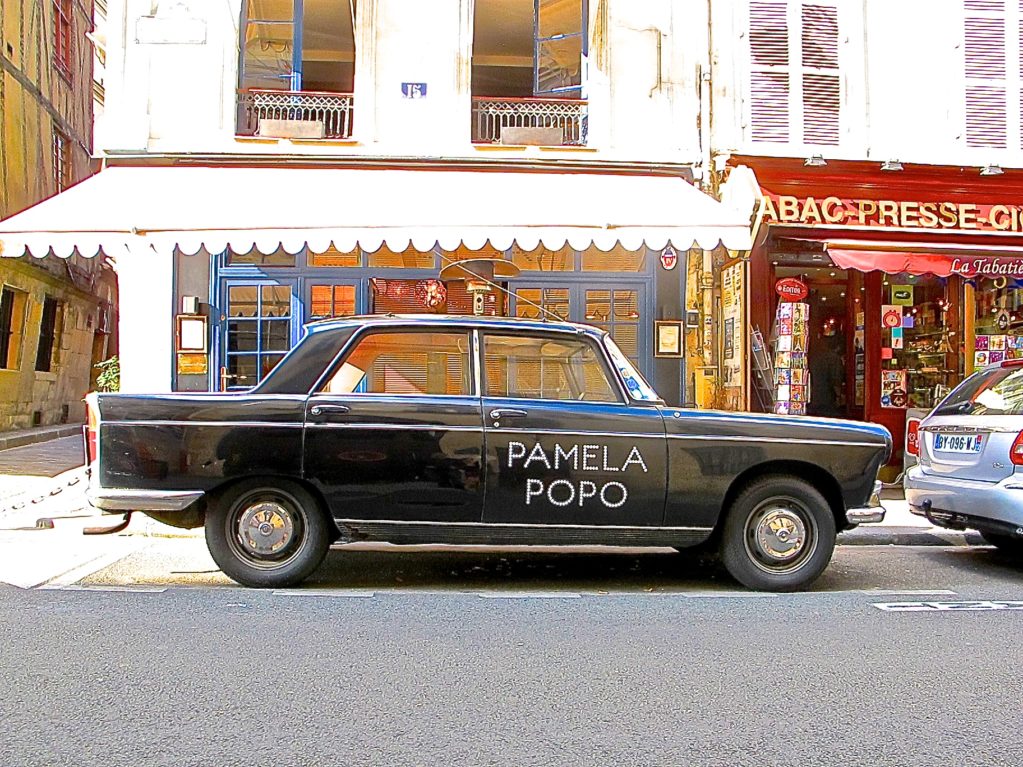 Peugeot 404 in Paris France at Pamela Popo restaurant